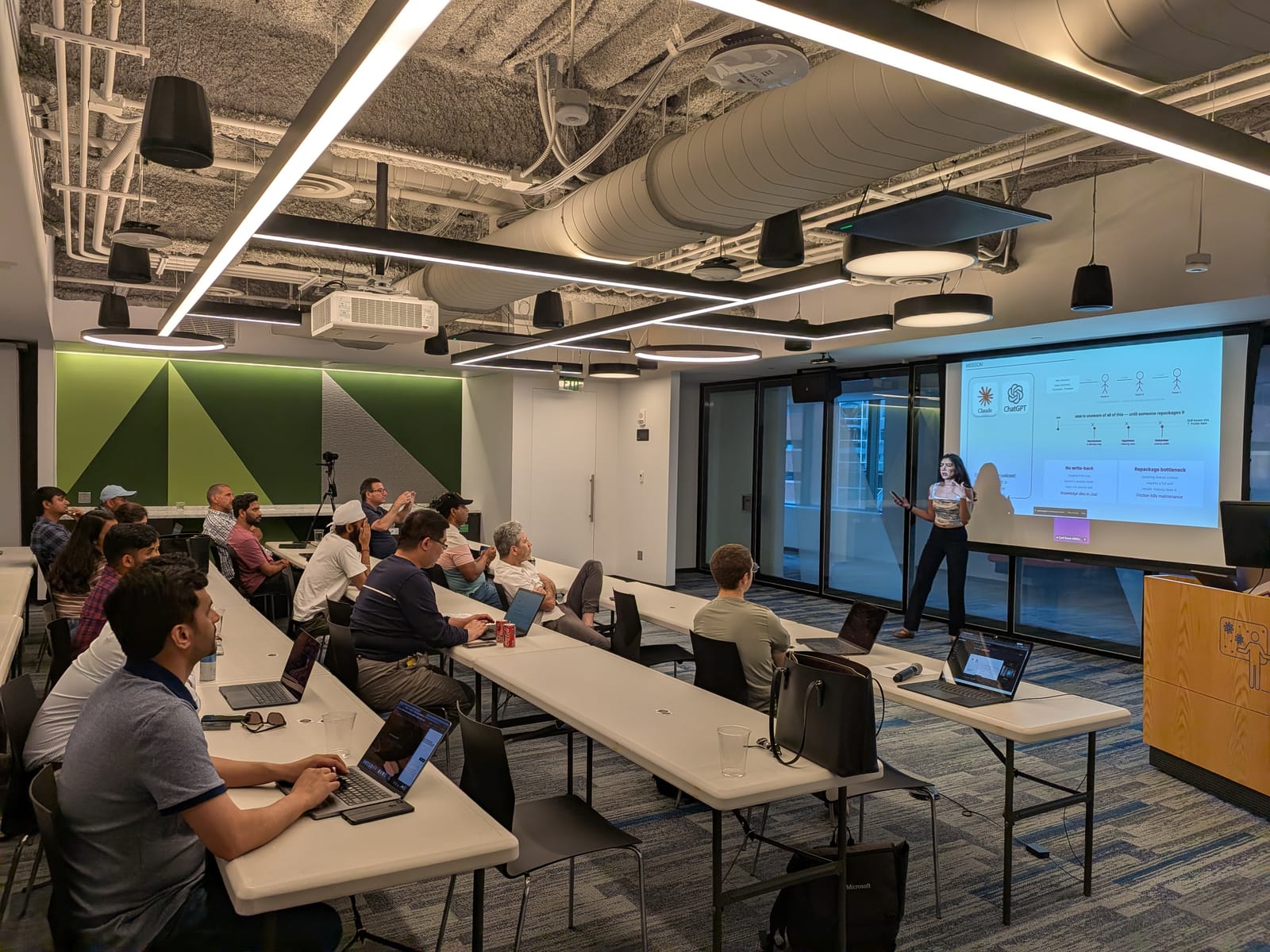 Ananya Shah presenting Beyond the Private Chatbot to the room