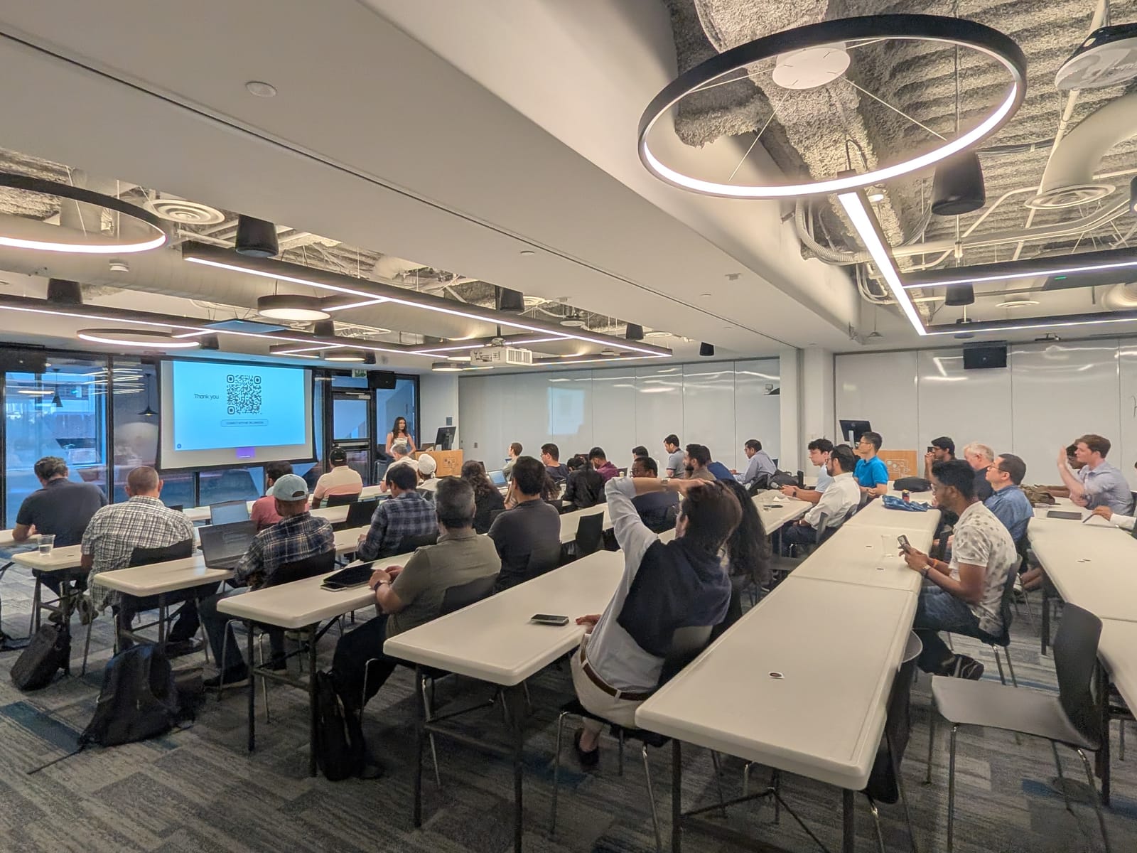 Practitioners watching a talk at The AI Runtime Boston