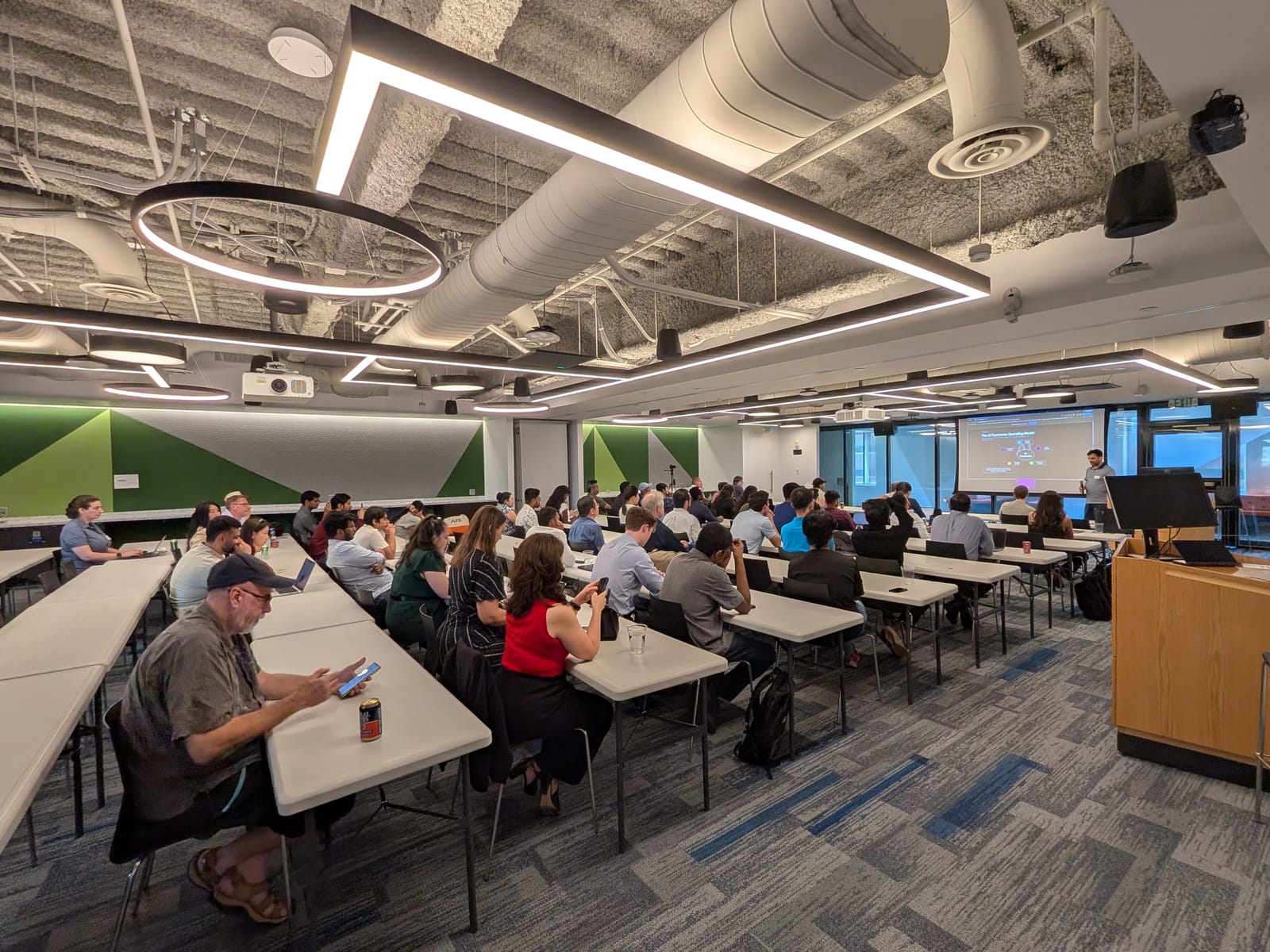 A full room of practitioners at The AI Runtime Boston for AI as a Teammate